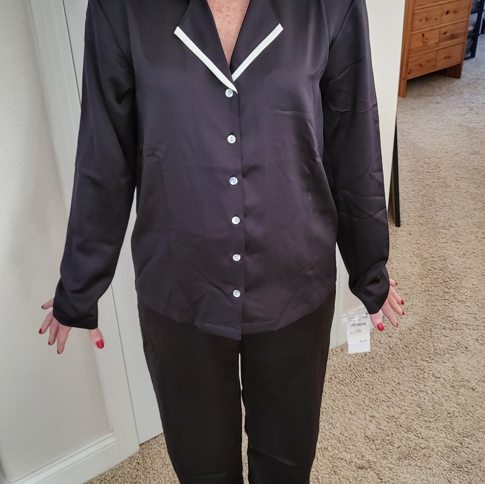 Satin-like, black with white trim pajamas, size XS.